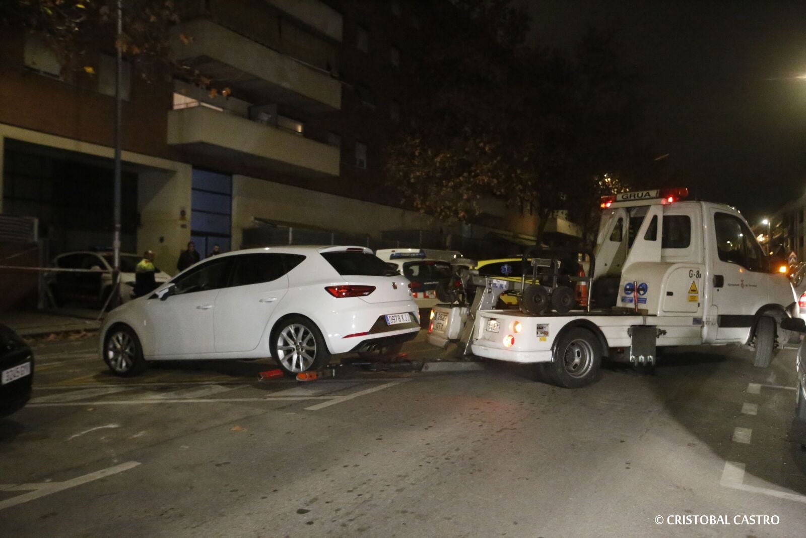 Una grua retirant un cotxe | Cristóbal Castro